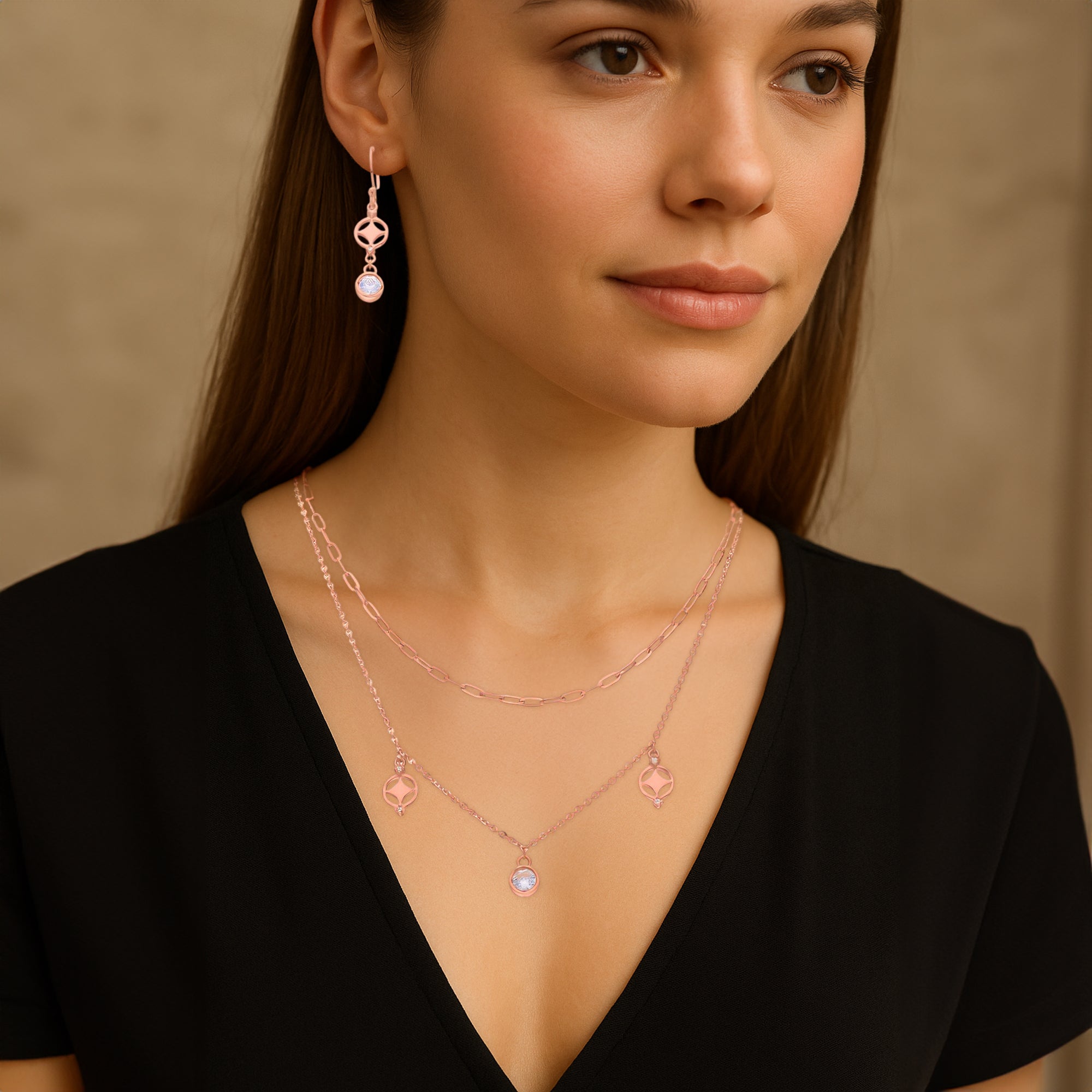 Delicate Rose Gold Layered Necklace and Earring Set with Abstract Charm Details and Sparkling Center Stones