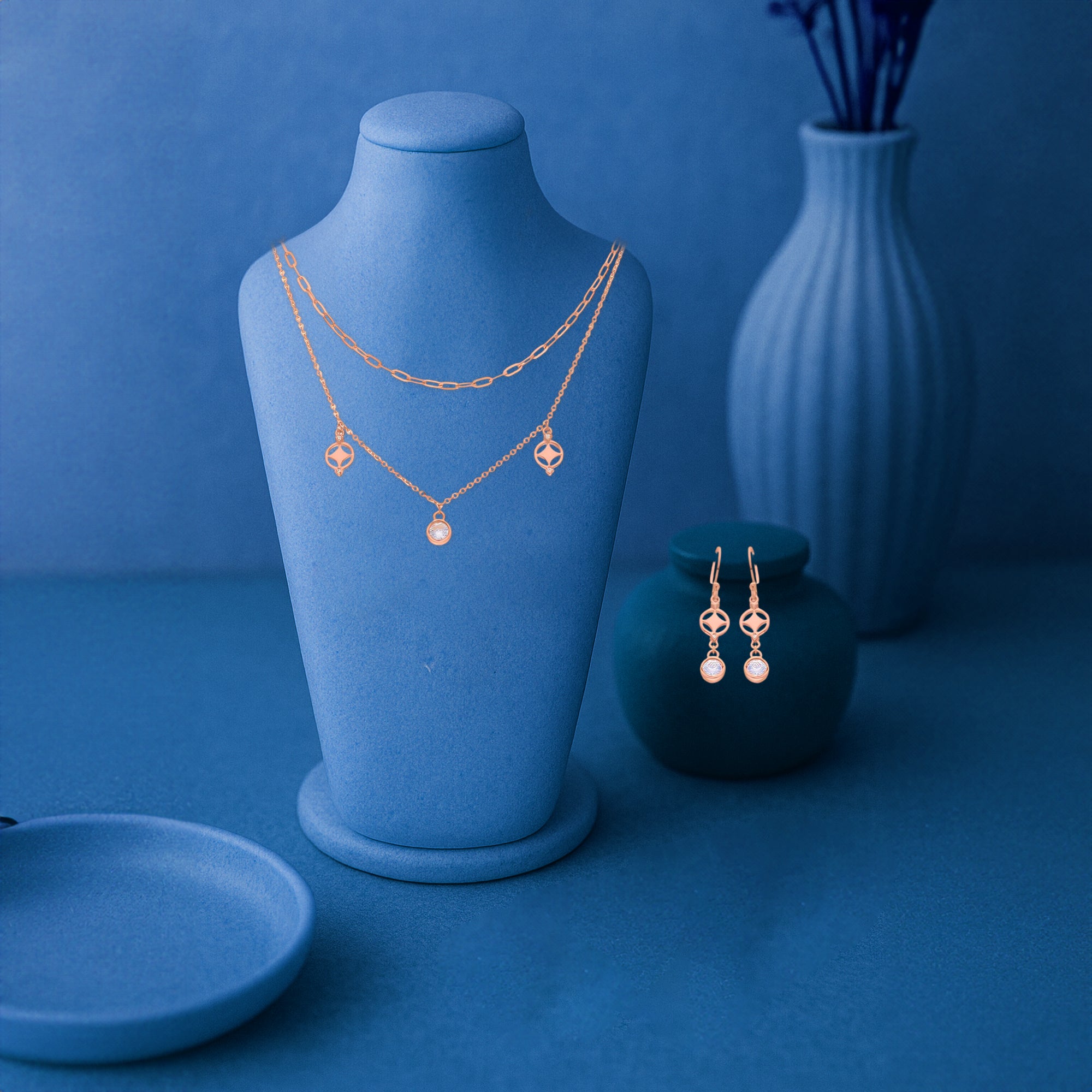 Delicate Rose Gold Layered Necklace and Earring Set with Abstract Charm Details and Sparkling Center Stones