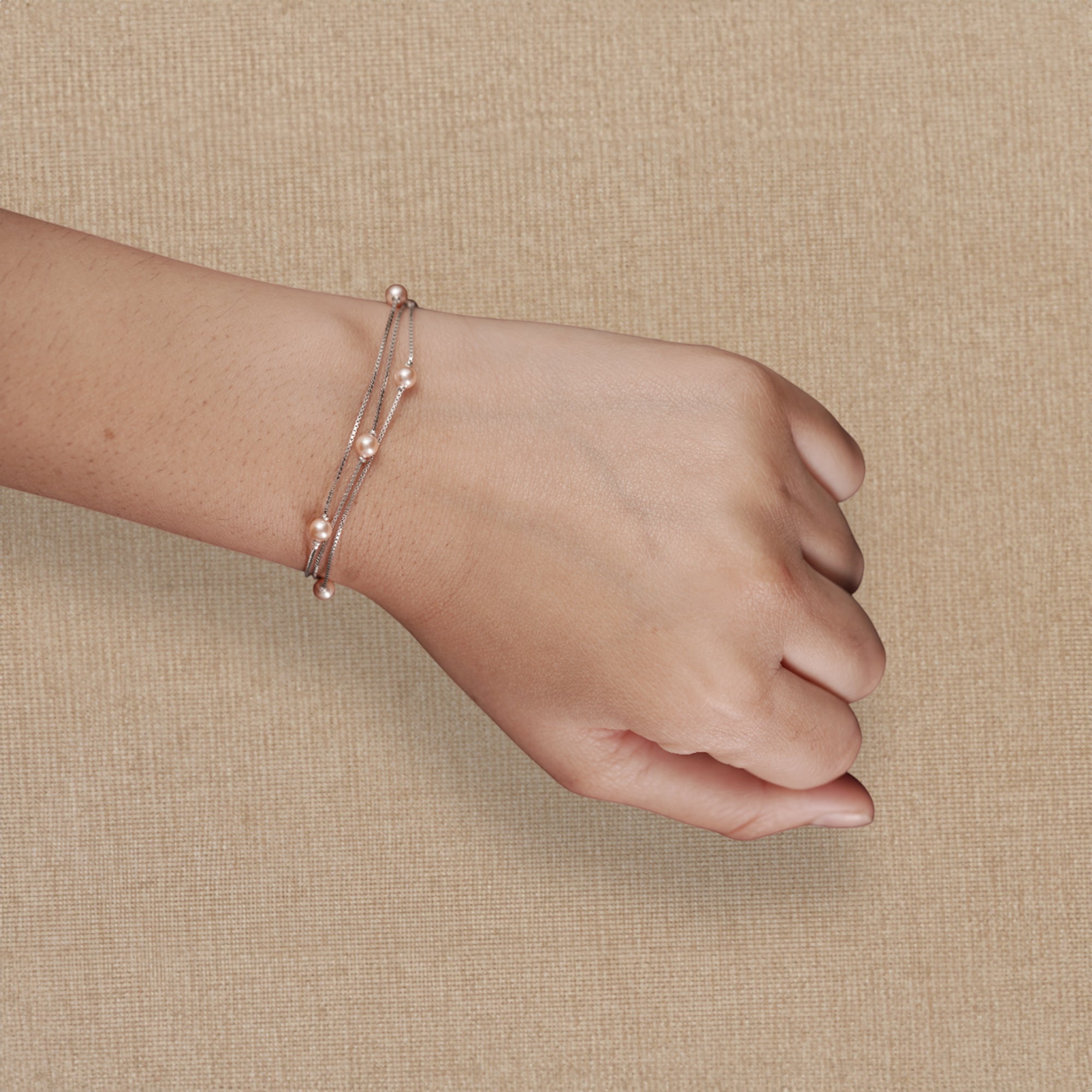 Double-Strand Silver Bracelet with Soft Pink Pearl Accents