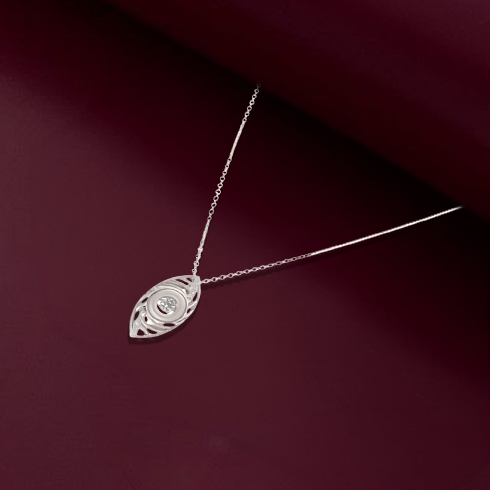 Sterling Silver Leaf-Shaped Pendant Necklace with Dazzling Center Stone