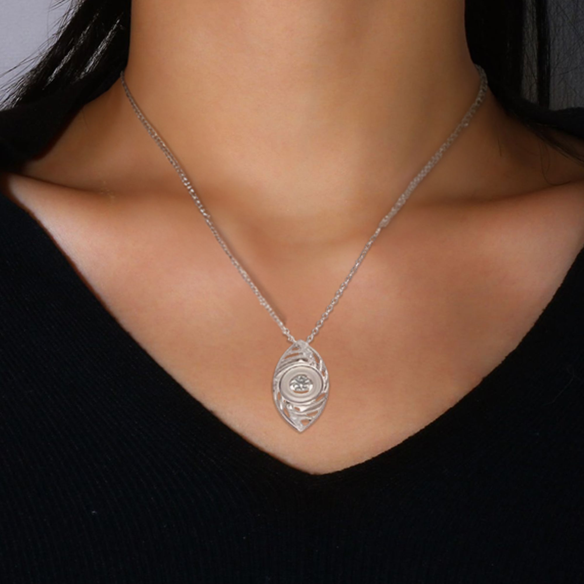 Sterling Silver Leaf-Shaped Pendant Necklace with Dazzling Center Stone