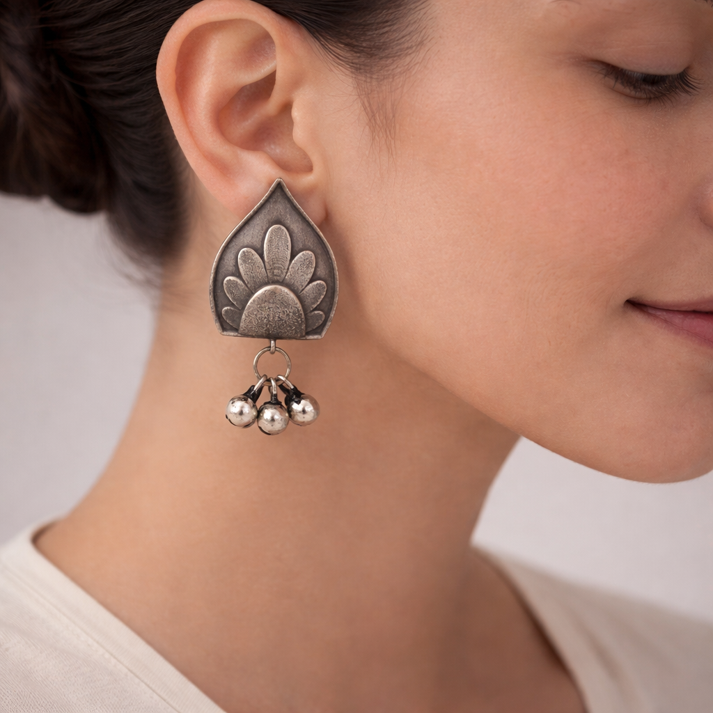 Nivedita- Silver Brass Oxidisd dangler earrings