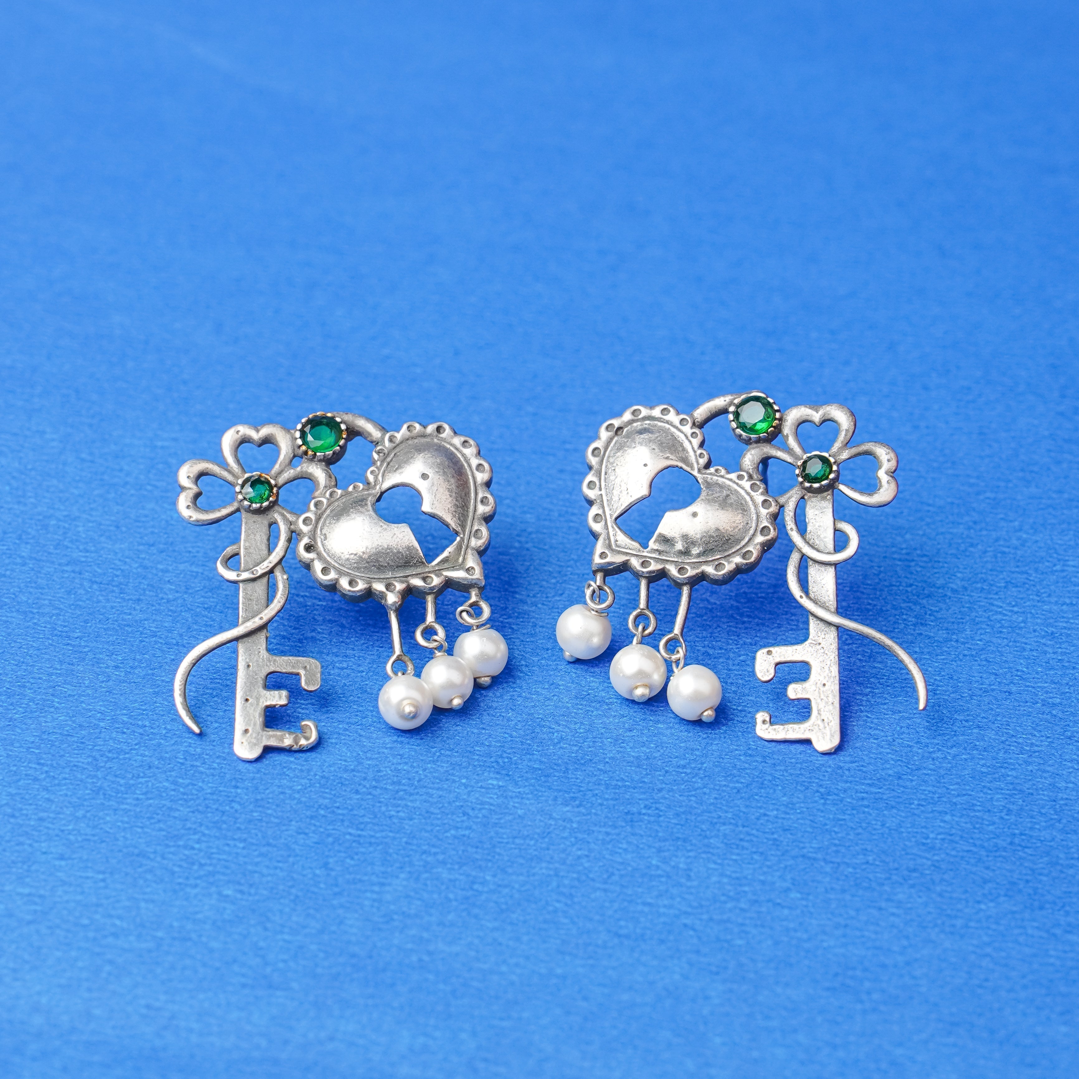Kunjika- Silver Brass Oxidised dangler earrings (Green)