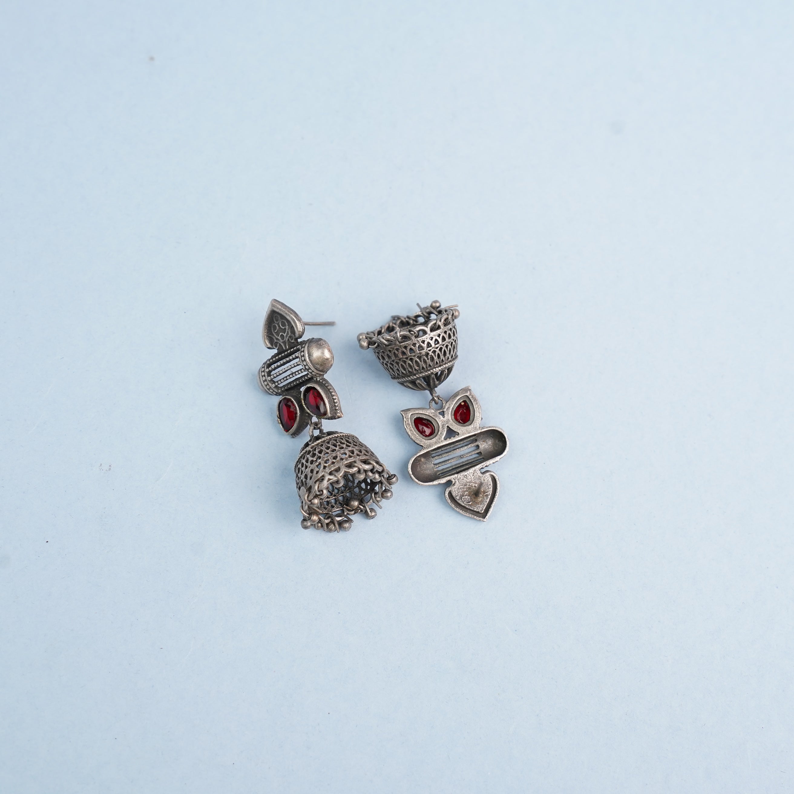 Taal- Silver Brass Oxidised jhumka earrings(Red)